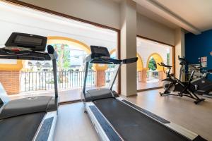 a gym with two treadmills and a treadmill at TUI Blue Isla Cristina Palace - Adults Recommended in Isla Cristina