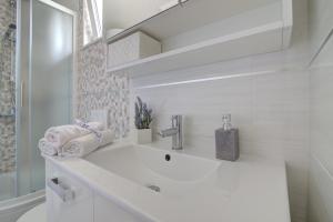 Koupelna v ubytování Apartman Luka + 37 fotografií