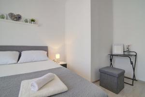 Postel nebo postele na pokoji v ubytování Apartman Luka