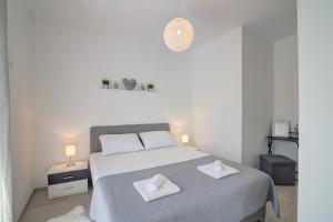Postel nebo postele na pokoji v ubytování Apartman Luka