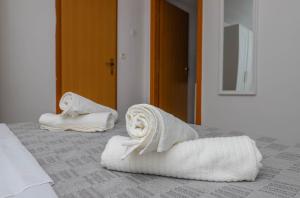 Posteľ alebo postele v izbe v ubytovaní Apartment Lisinski + 37 fotografií