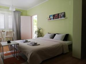 A bed or beds in a room at Apartment Jazz