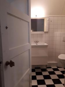 Koupelna v ubytování het Binnenhuis + 27 fotografií