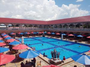 an overhead view of a pool at a resort at Grand Town Hotel Mandai in Makassar