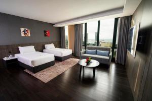 Postel nebo postele na pokoji v ubytování Jazz Hotel Penang