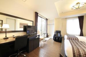 TV a/nebo společenská místnost v ubytování Hotel Coco Grand Kitasenju