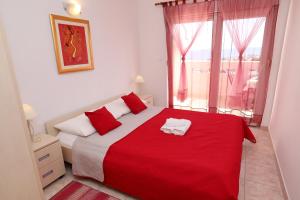 Posteľ alebo postele v izbe v ubytovaní Apartment Mavarčica + 19 fotografií