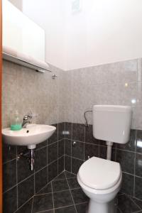 Kúpeľňa v ubytovaní Apartment Mavarčica