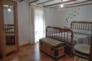 Postel nebo postele na pokoji v ubytování Casa Azafrán