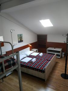 Voodi või voodid majutusasutuse Hostel Portal toas