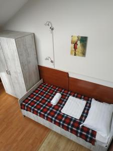 Voodi või voodid majutusasutuse Hostel Portal toas