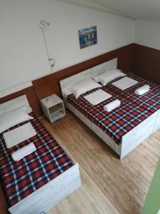 Voodi või voodid majutusasutuse Hostel Portal toas