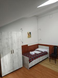 Voodi või voodid majutusasutuse Hostel Portal toas