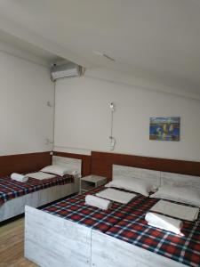 Voodi või voodid majutusasutuse Hostel Portal toas