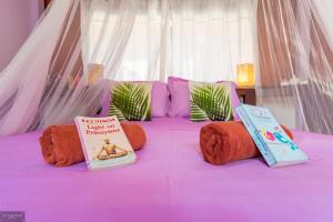 Postel nebo postele na pokoji v ubytování Seaboard Bungalow