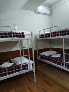 Voodi või voodid majutusasutuse Hostel Portal toas