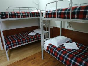 Voodi või voodid majutusasutuse Hostel Portal toas