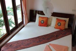 Postel nebo postele na pokoji v ubytování Seaboard Bungalow