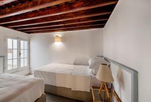 Postel nebo postele na pokoji v ubytování Casa Elettra