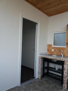 TV a/nebo společenská místnost v ubytování Qeparo Antonio Rooms