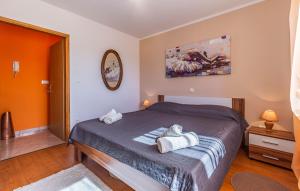 Una cama o camas en una habitación de Apartment Meri