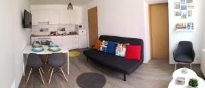 Kuchyň nebo kuchyňský kout v ubytování Green Garden Plus Apartman