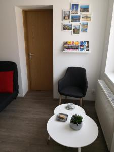 Posezení v ubytování Green Garden Plus Apartman