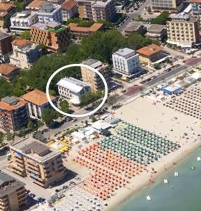 an overhead view of a city with a beach and buildings at Hotel Ariston in Cesenatico