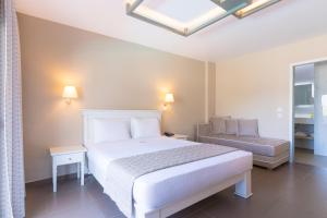 Ntinas Filoxenia Hotel & Spa客房内的一张或多张床位