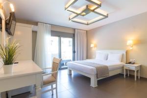 Krevet ili kreveti u jedinici u okviru objekta Ntinas Filoxenia Hotel & Spa
