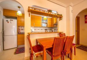 Kuchnia lub aneks kuchenny w obiekcie APARTAMENTO "CARMEN" Zeniamar
