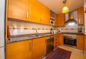 Kuchnia lub aneks kuchenny w obiekcie APARTAMENTO "CARMEN" Zeniamar