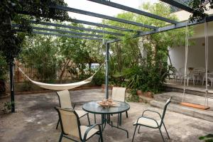 En terrasse eller udendørsområde på Elies Villa