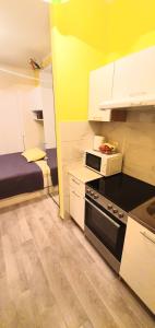 Kuchyňa alebo kuchynka v ubytovaní Apartments Sinković