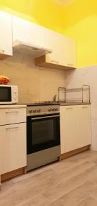Kuchyňa alebo kuchynka v ubytovaní Apartments Sinković