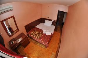 Letto o letti in una camera di Hotel Royal