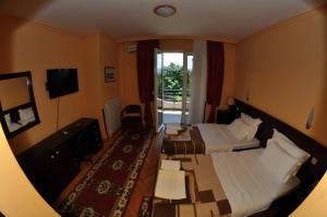 TV a/nebo společenská místnost v ubytování Hotel Royal
