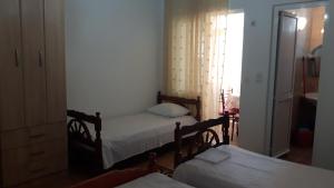 Cama o camas de una habitación en Guesthouse Sinani