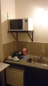 Kitchen o kitchenette sa Apart Hotel Austral