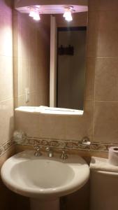 Phòng tắm tại Apart Hotel Austral