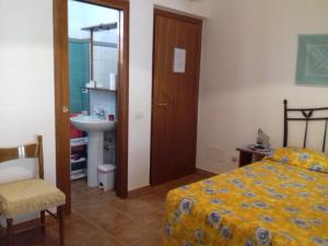 A bed or beds in a room at Canne Al Vento