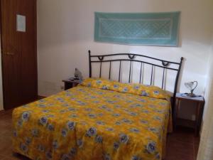 A bed or beds in a room at Canne Al Vento