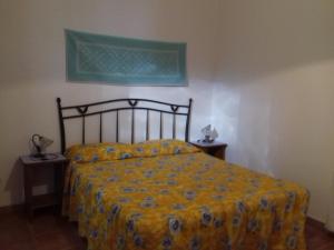 A bed or beds in a room at Canne Al Vento