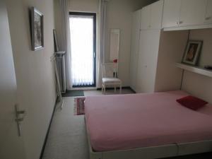 
A bed or beds in a room at Mira 9D
