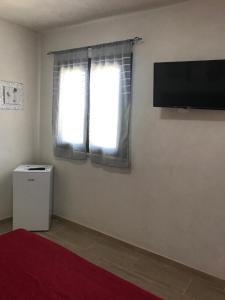 TV a/nebo společenská místnost v ubytování B&B "Sara"