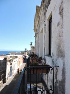 a balcony of a building with a view of the ocean at Hotel I Cinque Balconi in Santa Marina Salina