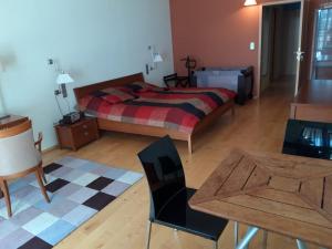 Postel nebo postele na pokoji v ubytování Apartmány Puerto