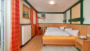 מיטה או מיטות בחדר ב-Biogasthaus Wanker