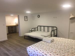 Postel nebo postele na pokoji v ubytování Hassan Guesthouse