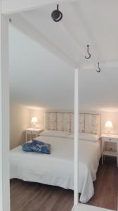 Postel nebo postele na pokoji v ubytování Santa Lucia B&B